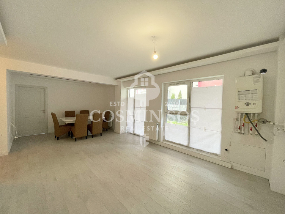 Apartament cu 3 camere de vanzare, cu gradina si parcare, Floresti