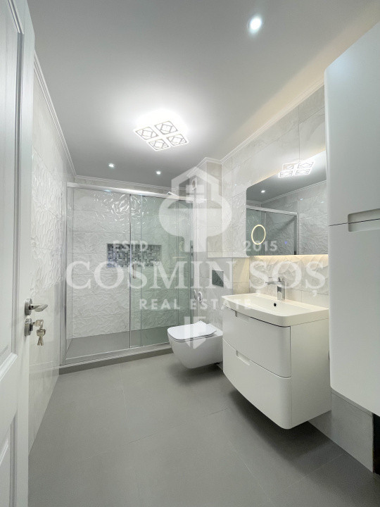 Apartament cu 3 camere de vanzare, cu gradina si parcare, Floresti
