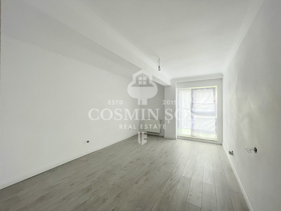 Apartament cu 3 camere de vanzare, cu gradina si parcare, Floresti