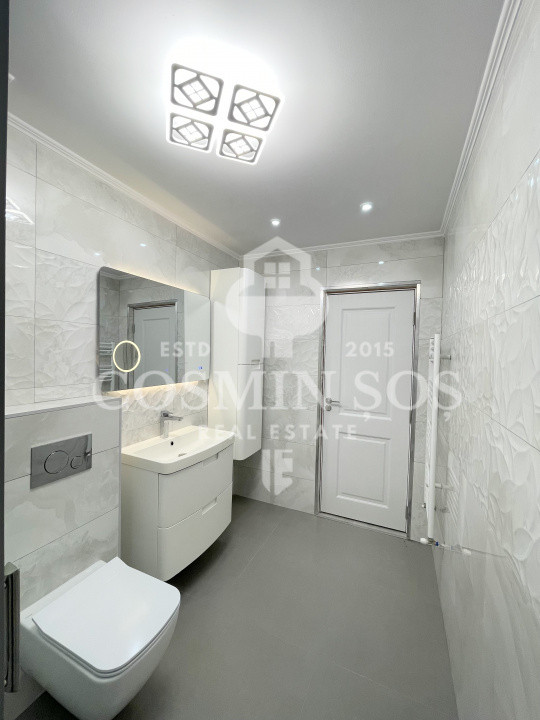 Apartament cu 3 camere de vanzare, cu gradina si parcare, Floresti