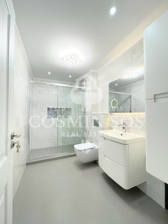 Apartament cu 3 camere de vanzare, cu gradina si parcare, Floresti