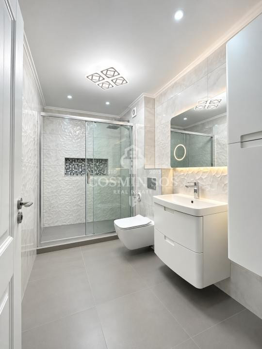 Apartament cu 3 camere, curte proprie si parcare, de vanzare in Floresti