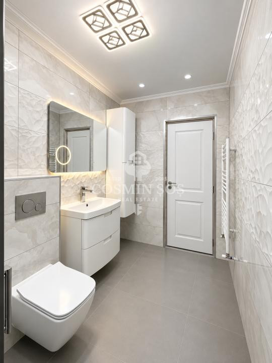 Apartament cu 3 camere, curte proprie si parcare, de vanzare in Floresti
